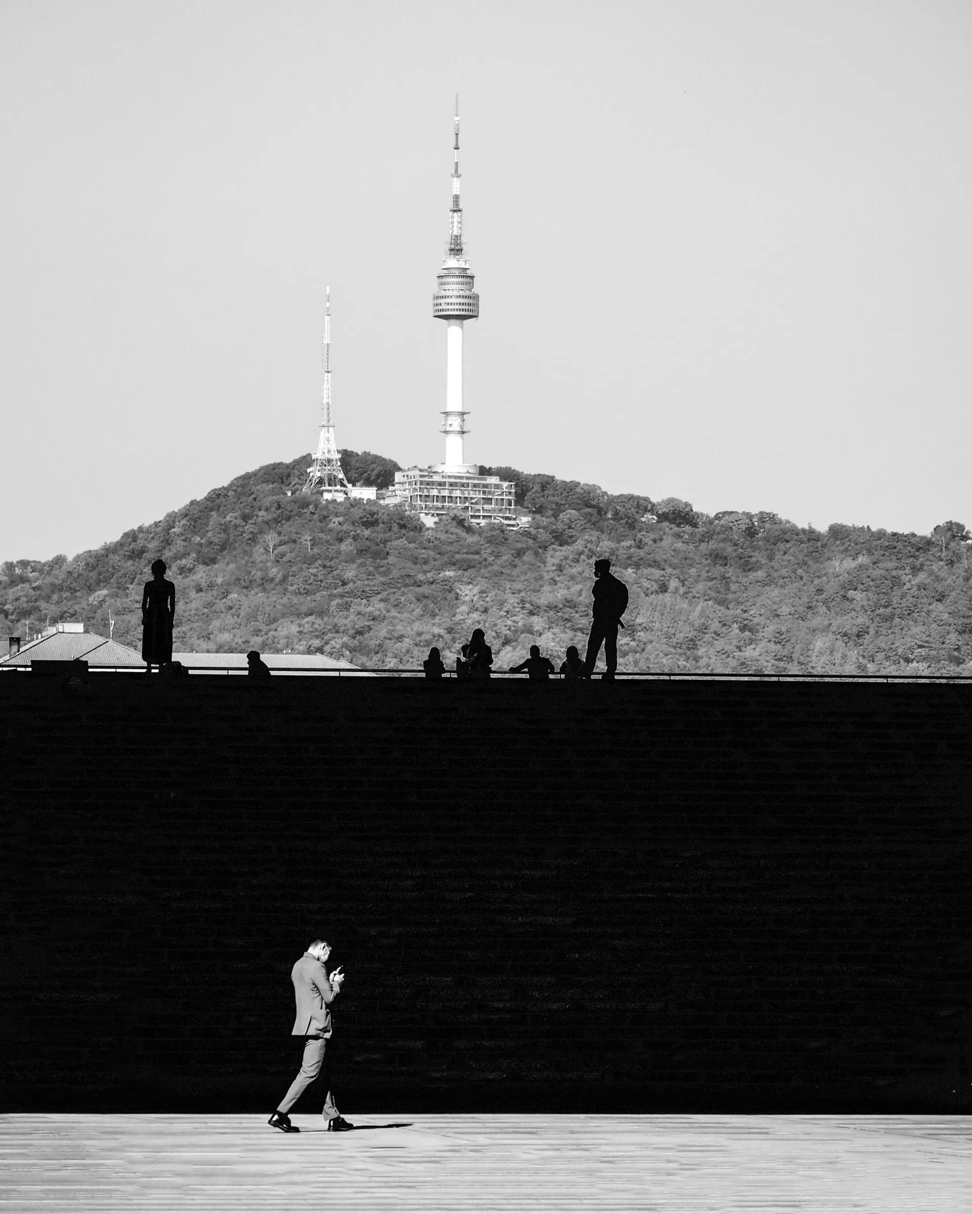 A worker walks along the steps of the National Museum