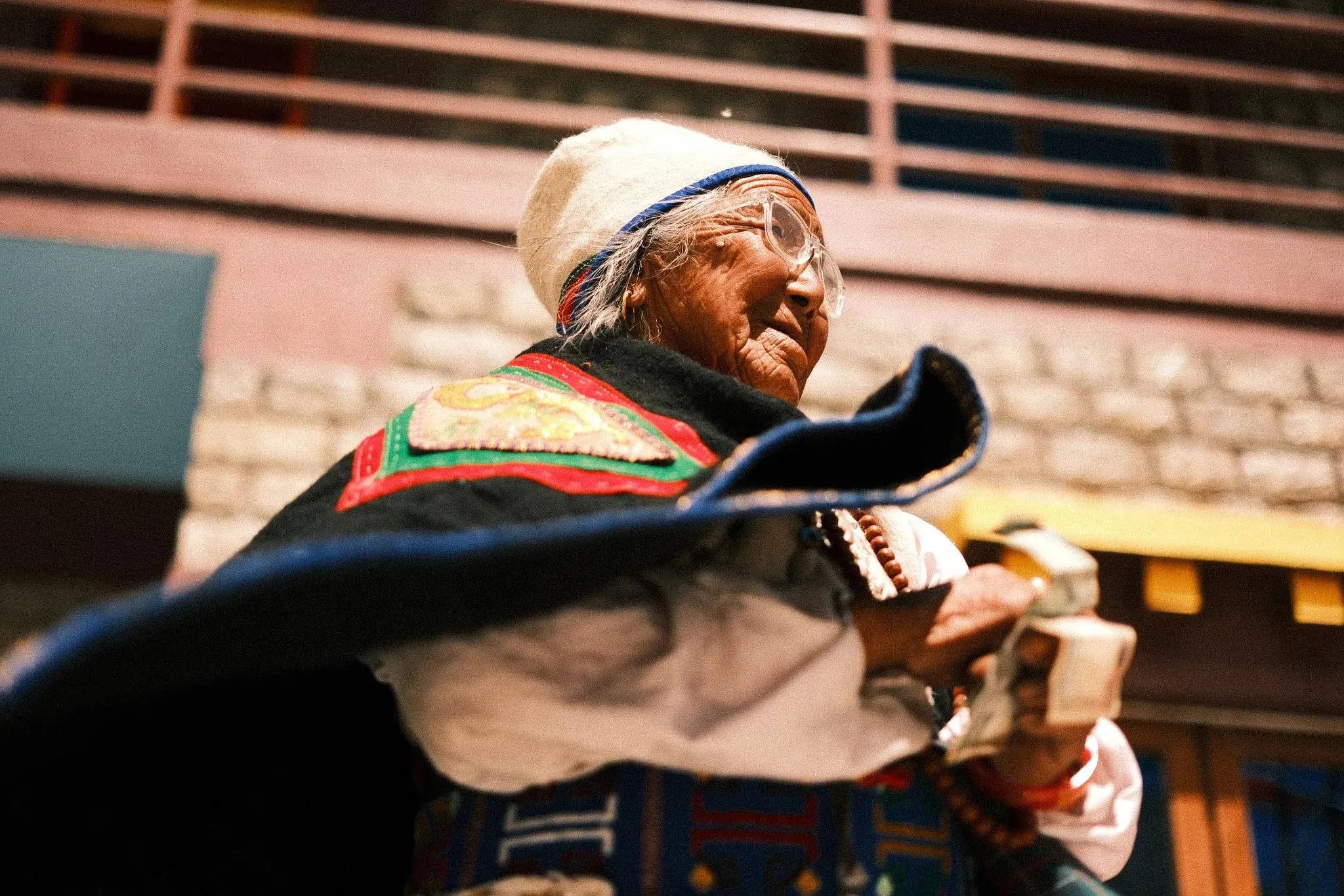 Colour photo of a Tibetan woman in Upper Mustang
