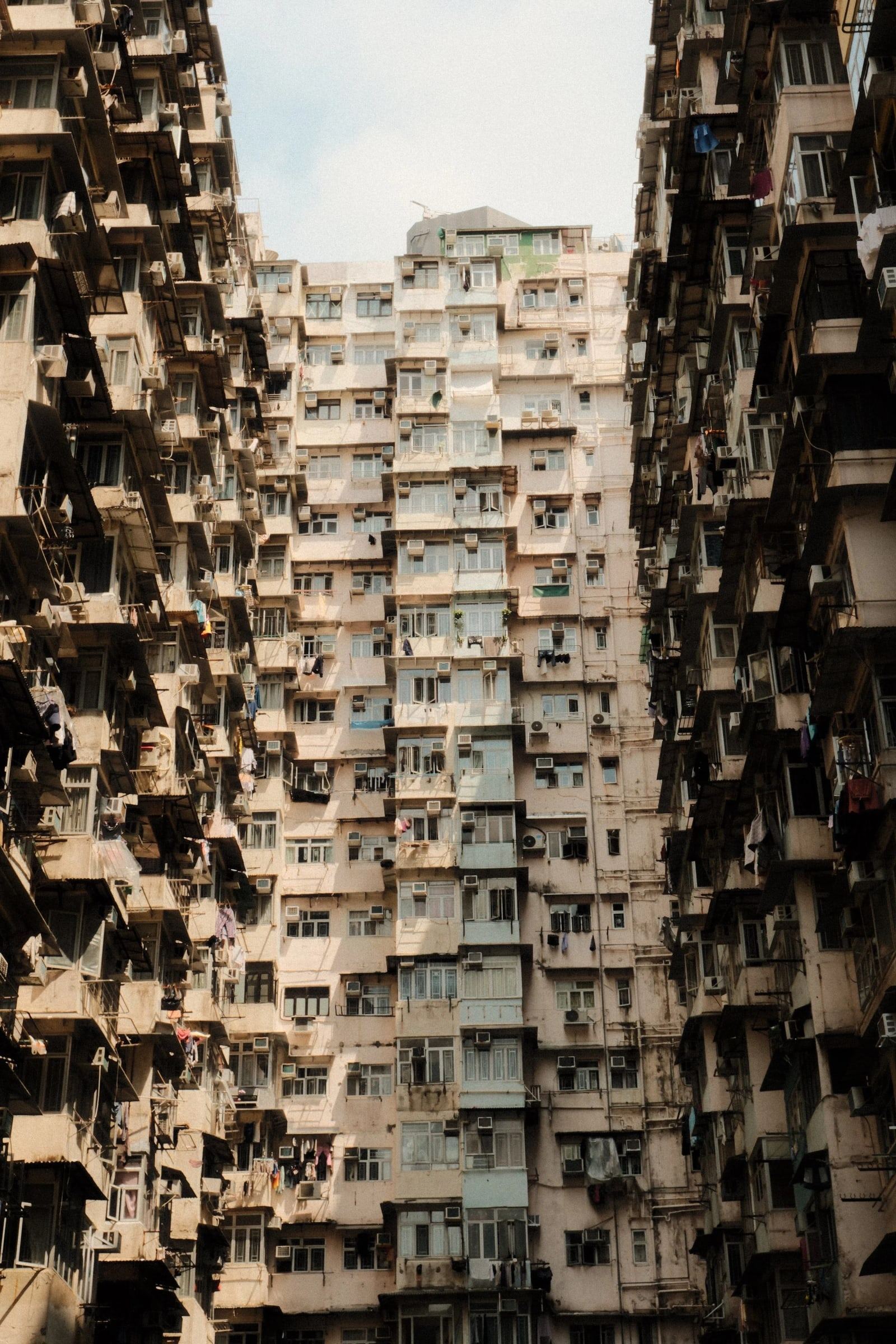 Tall residential towers crowded around a narrow courtyard